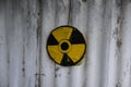 Nuclear reactor symbol. Round ÃÂºotating Ãâuclear and ÃÂ¸iohazard Sign on the fence. Grunge biohazard symbol. Grunge biohazard sign